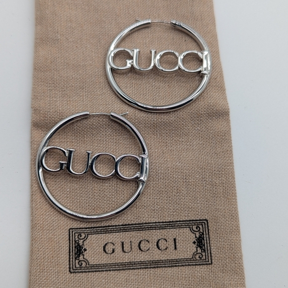 Gucci Silver-Tone Logo Hoop Earrings - Picture 1 of 7